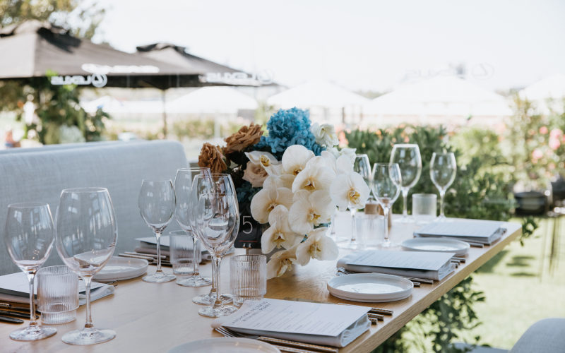 Flowers and table setting adorning a trackside table at Flemington Racecourse - at the LANDMARK by Lexus event.
