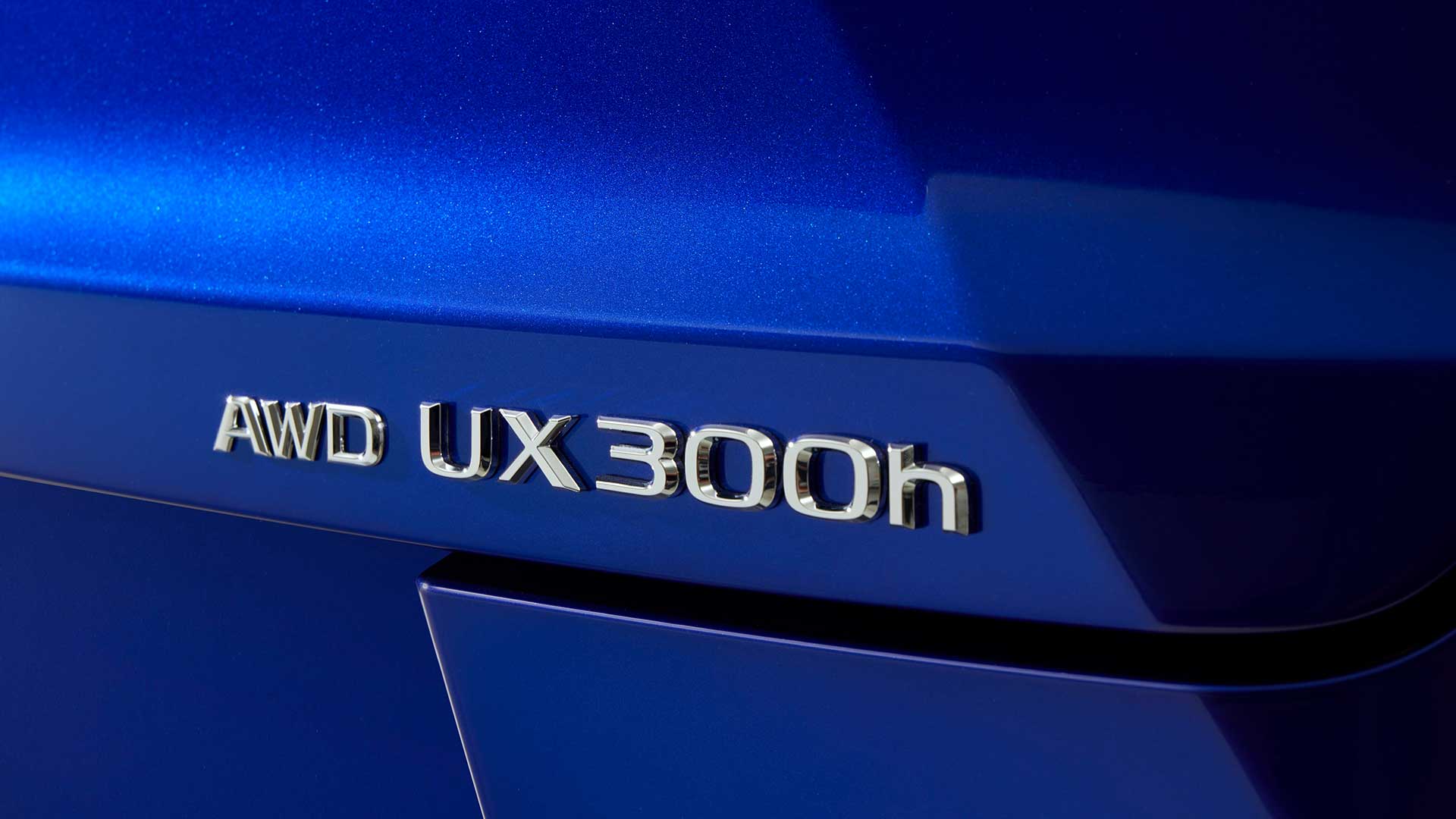 New UX 300h badging reflects the increase in hybrid power. Overseas pre-production model shown. Australian grades, features & specifications may differ. See your Lexus dealer for details.