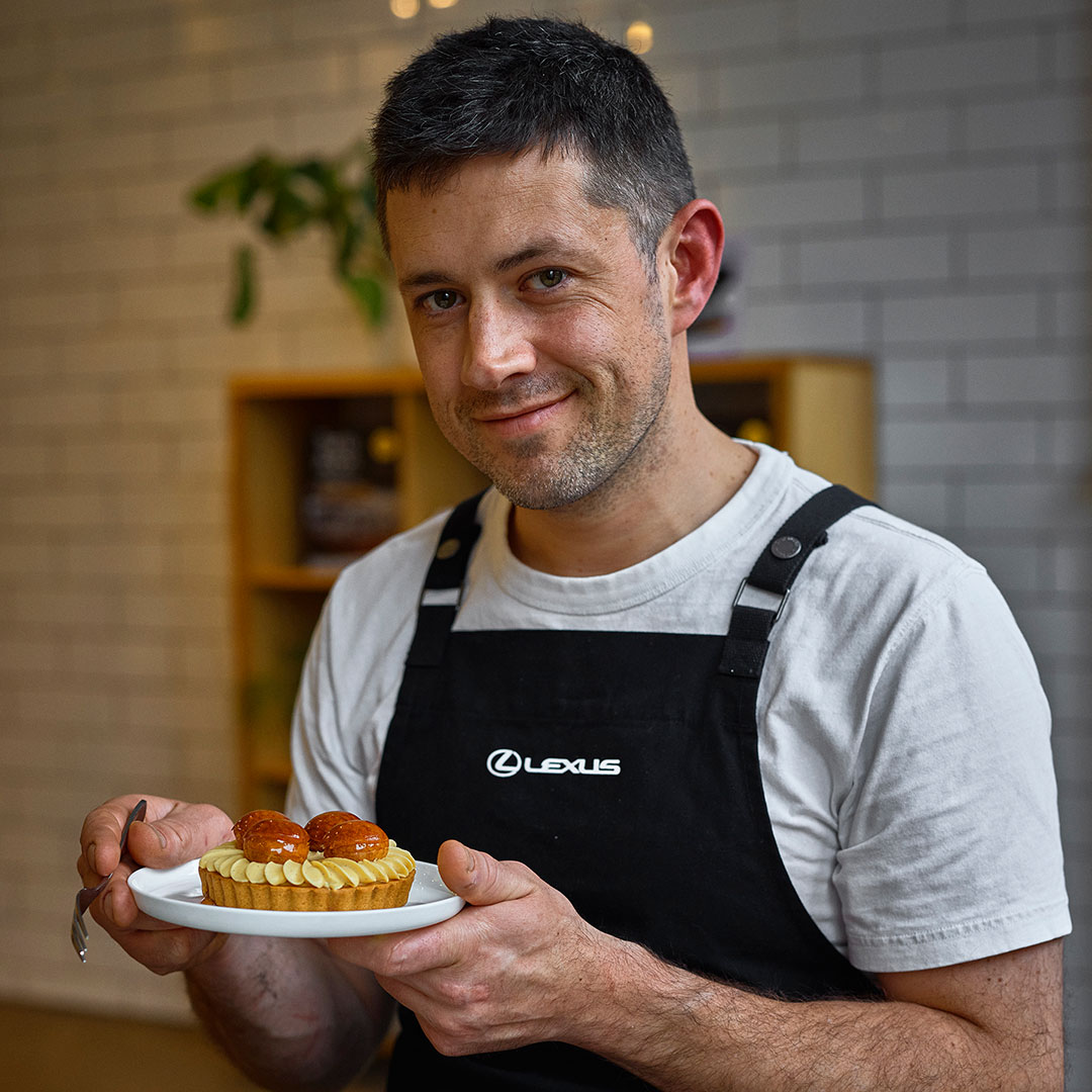 Chef Gareth Whitton with a plate of dessert