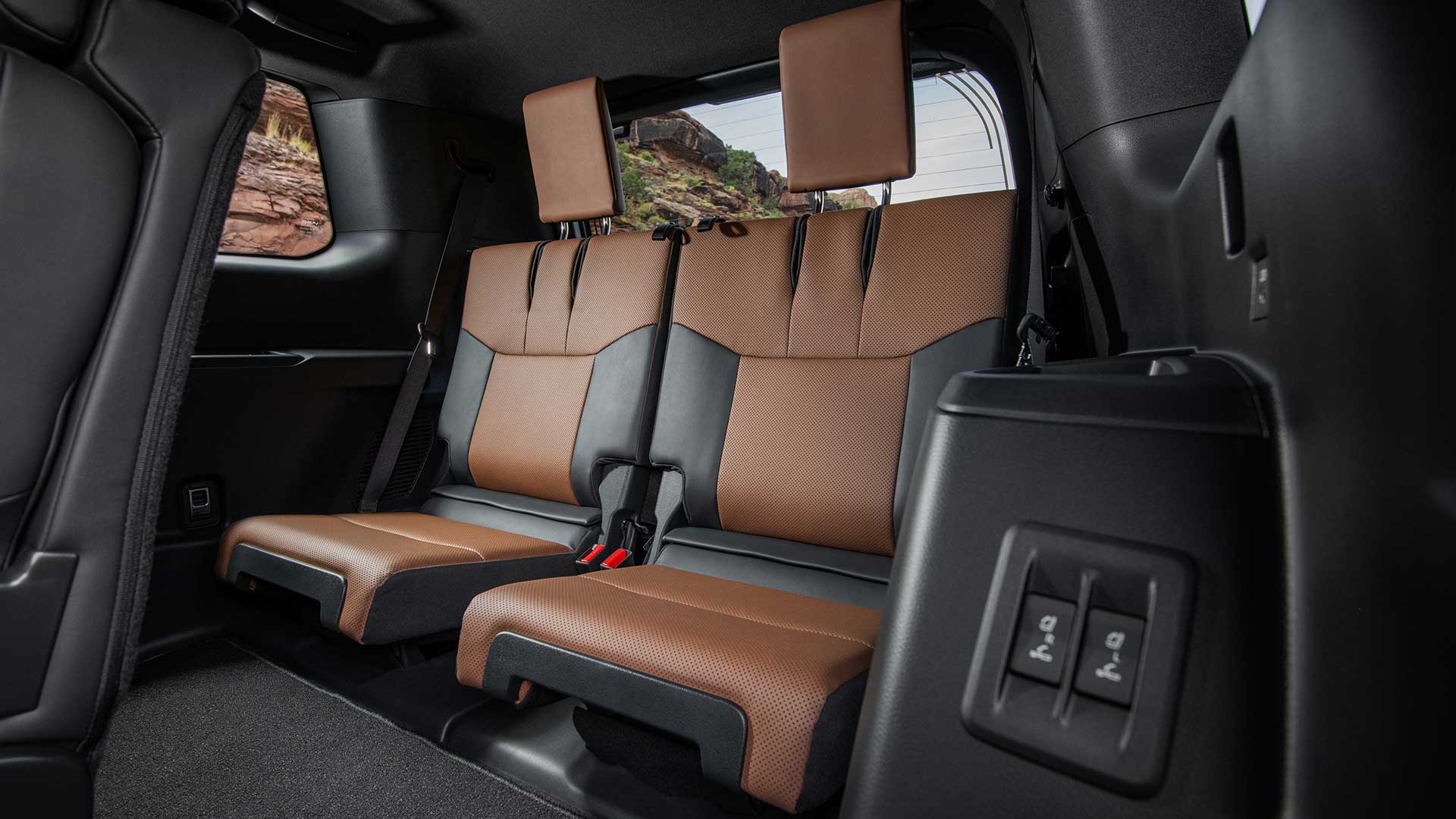 The back cabin of the Lexus GX featuring luxurious two-toned leather seats.