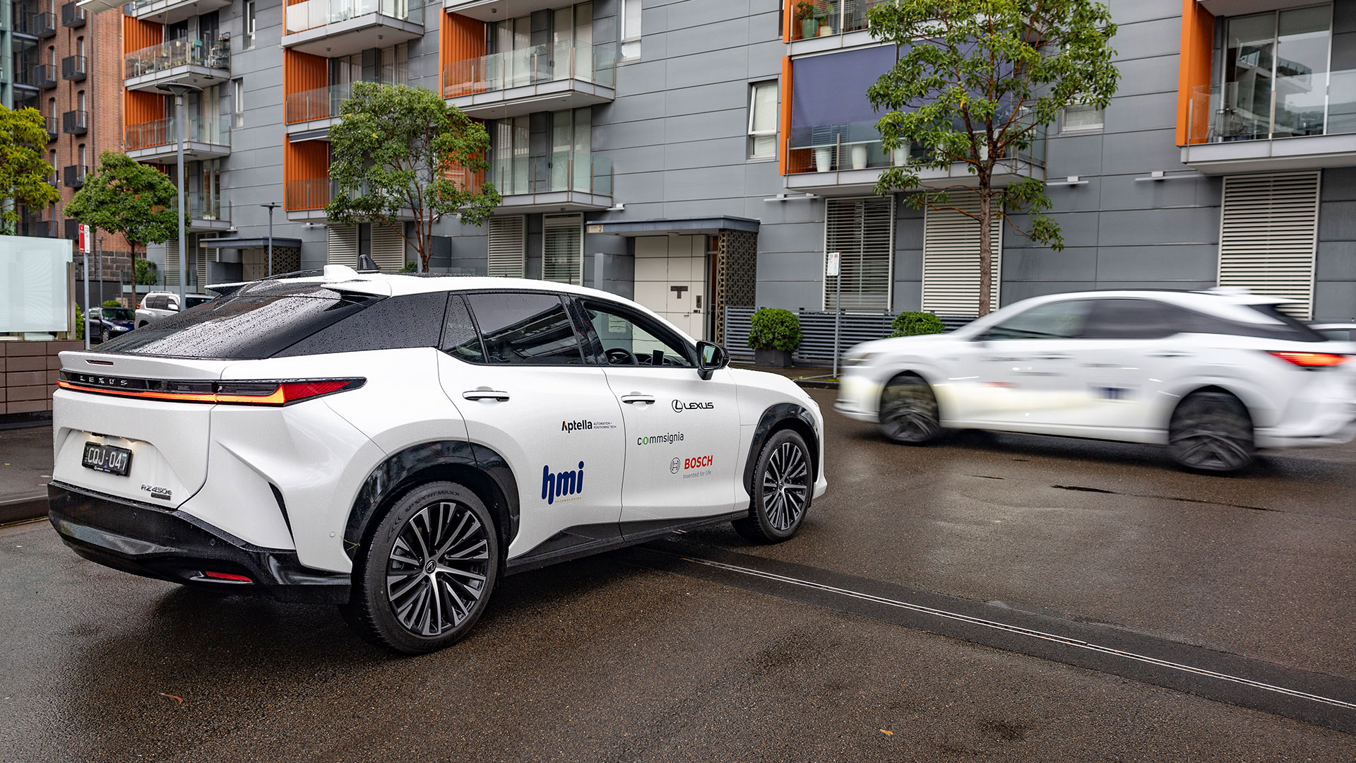 White Lexus vehicle showcasing cooperative awareness perception technologies