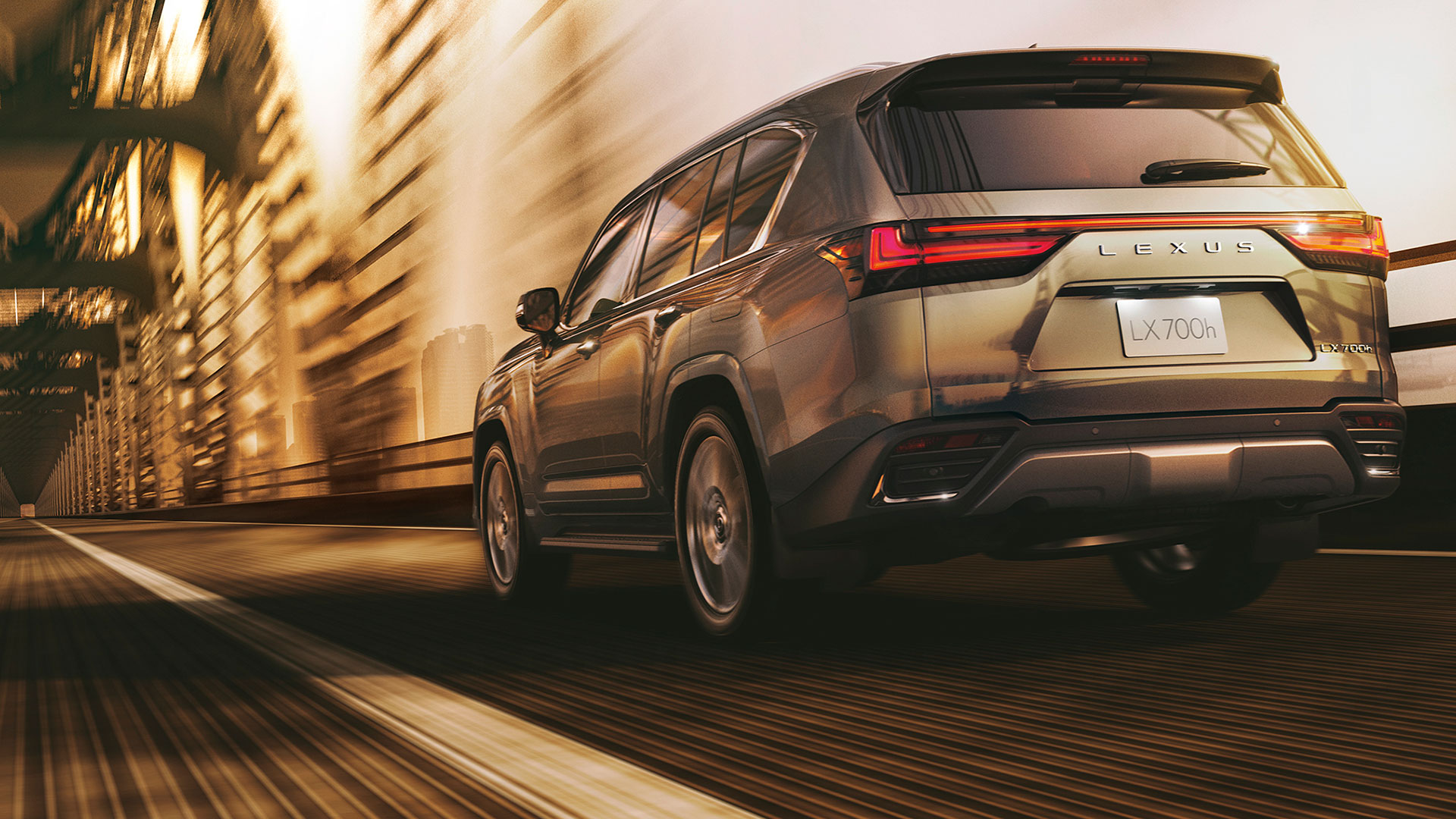 A Khaki Metal coloured Lexus LX driving on a bridge