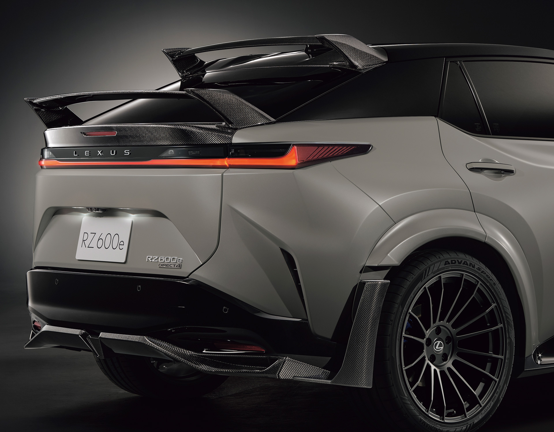 Rear view of the Lexus RZ 600e F Sport Performance in a studio setting