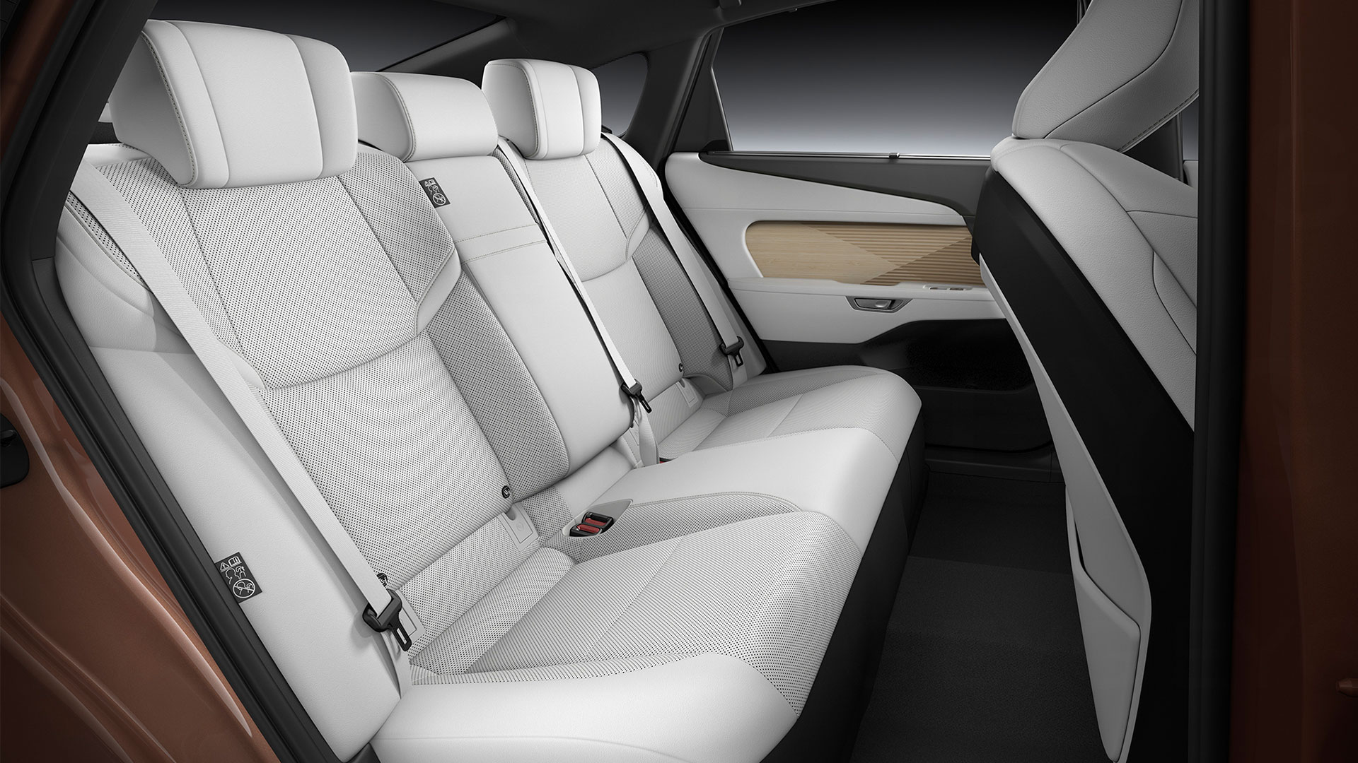 Lexus ES sedan's back seat cabin with white leather seats, side view.